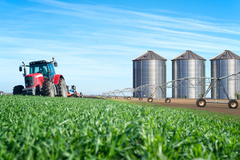 agriculture-food-production-concept-with-tractor-machine-silos-irrigation-system (2)